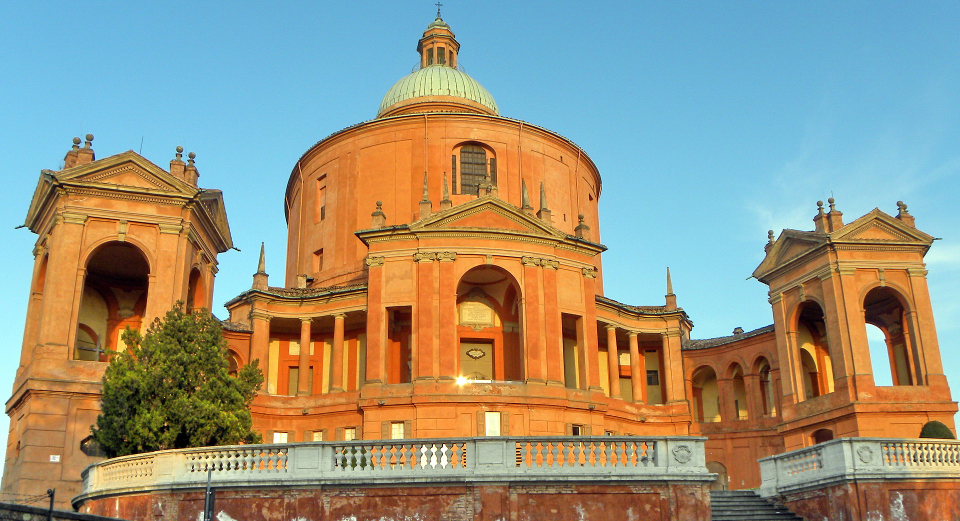 Bologna medieval city centre with the famous porticoes, terracotta rooftops and the towers of the Asinelli and Garisenda
