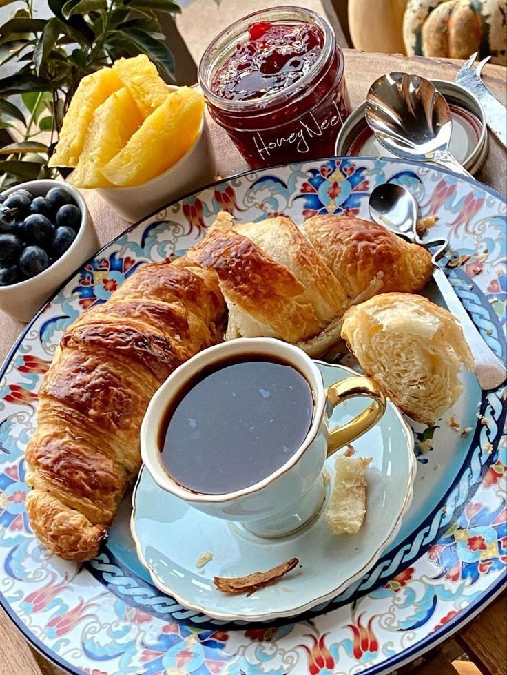A stunning display of French pastries and patisserie in a Parisian shop window