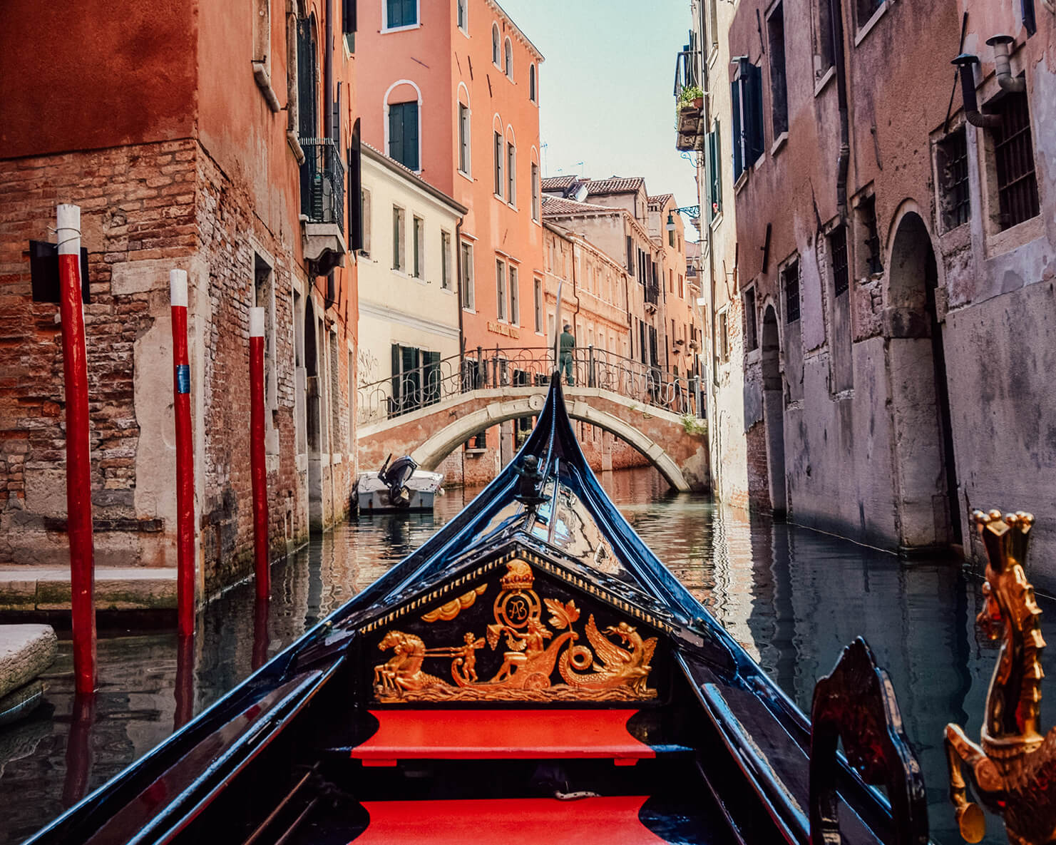 The Grand Canal of Venice at dawn — gondolas moored before the Santa Maria della Salute basilica